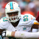 Illustration for article titled Dolphins Coaches Trying To Fix Ndamukong Suh’s Quarterback-Throwing Mechanics